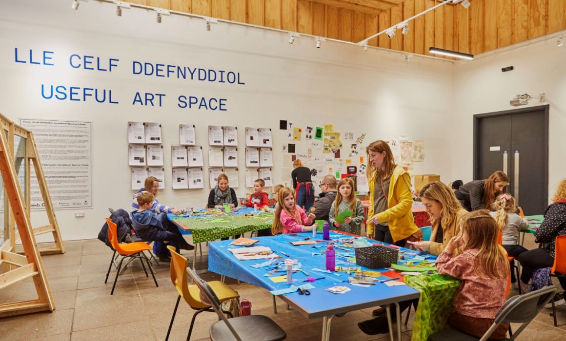 Families taking part in a craft activity in the Useful Art Space. Photo by Emli Bendixen.